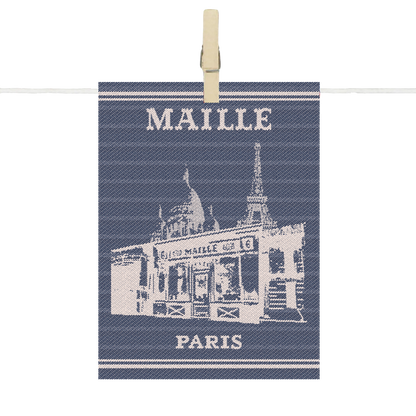 Para-tapas Maille Paris en textile bleu et écru, illustré de la façade emblématique de la boutique Maille de Paris avec l’inscription « Maille Paris ».