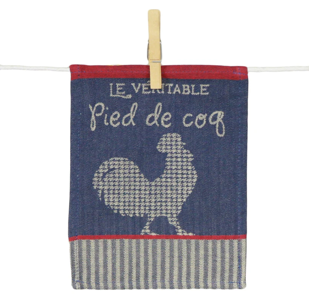Para-tapas « Le Véritable Pied de Coq » en textile bleu marine et écru, orné d’un motif de coq et d’une finition rayée inspirée du patrimoine gastronomique français.