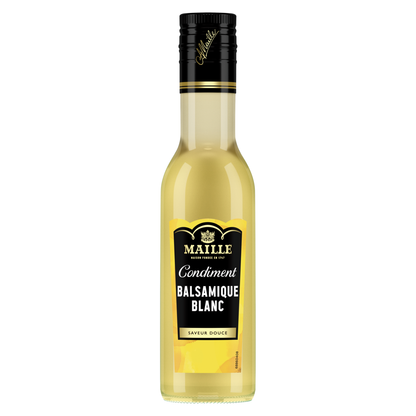 Condiment balsamique blanc Maille en bouteille en verre. Cette recette à la saveur douce est présentée dans un élégant flacon transparent avec étiquette noire et jaune signature de la Maison Maille.